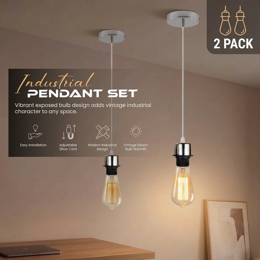 Two-pack of industrial pendant light fixtures with clear glass bulbs and silver metal sockets, shown hanging in a warm-toned room setting with promotional text overlays.