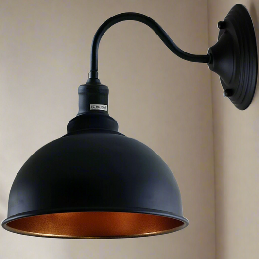 A collection of vintage wall lights in various colors including black, rustic red, brushed copper, and brushed silver.