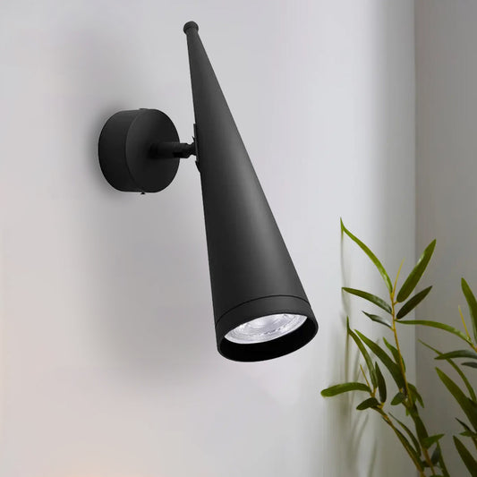 A modern LED black cone shade wall lamp with a GU10 bulb base, mounted on a wall and displaying a cone-shaped light beam.