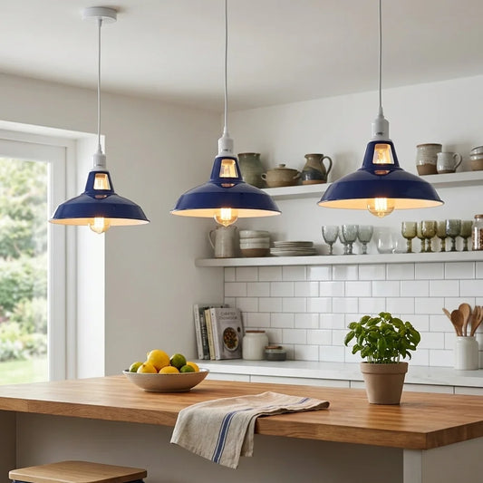 Modern kitchen with wooden table, blue pendant lights, and white shelves.