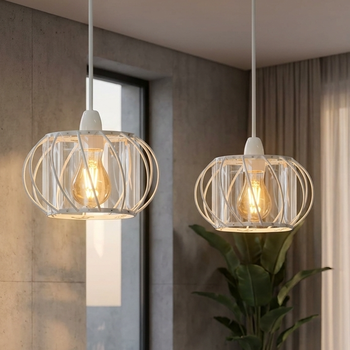 Modern dining room with two pendant lights hanging above a table.