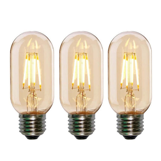 Three vintage-style filament light bulbs with clear glass envelopes and warm glowing filaments, shown side by side on a white background.
