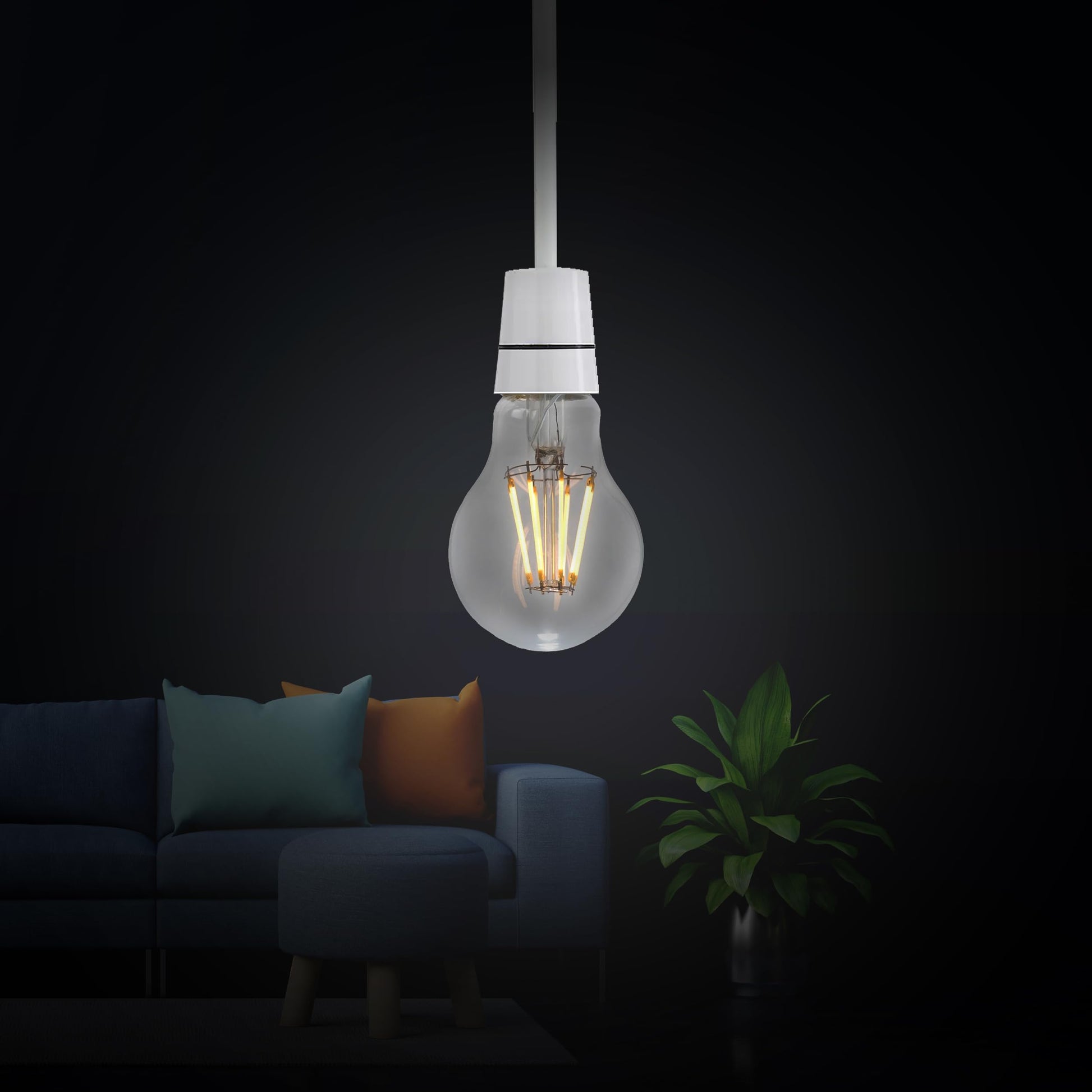 Light bulb hanging in a dark room