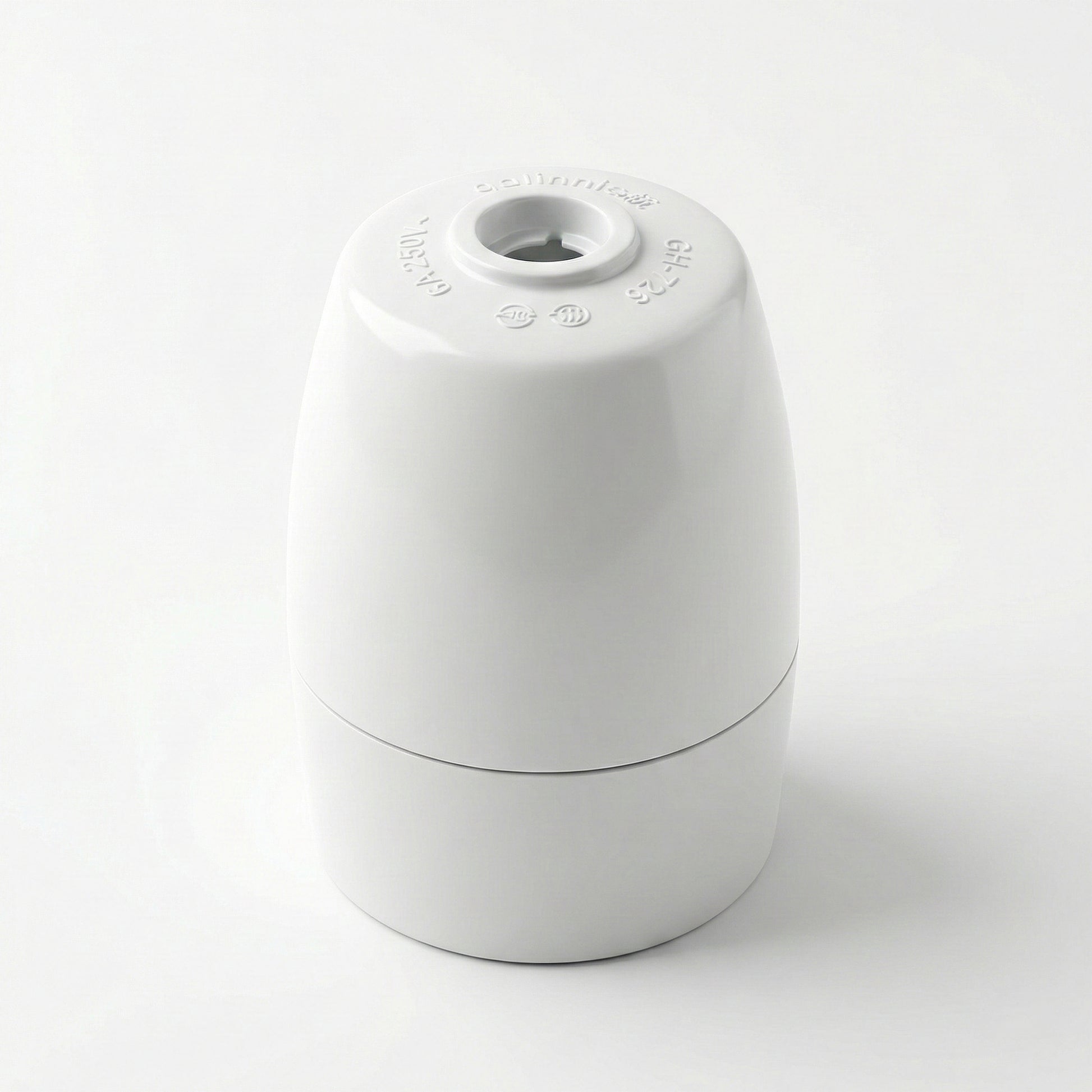 White ceramic vase on a light gray background