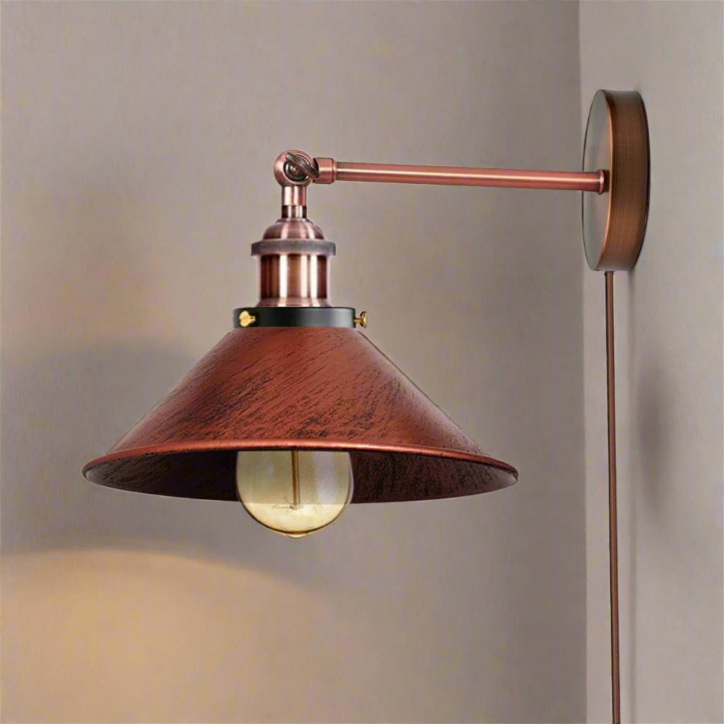 Vintage-style wall lamp with copper finish on a neutral background