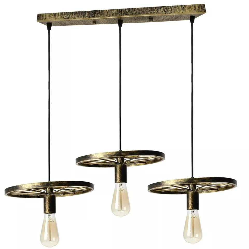 Three pendant ceiling lights with a vintage bike wheel 
