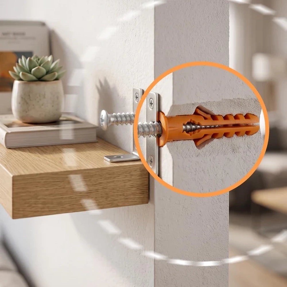 orange wall plug holding a floating shelf bracket to a wall