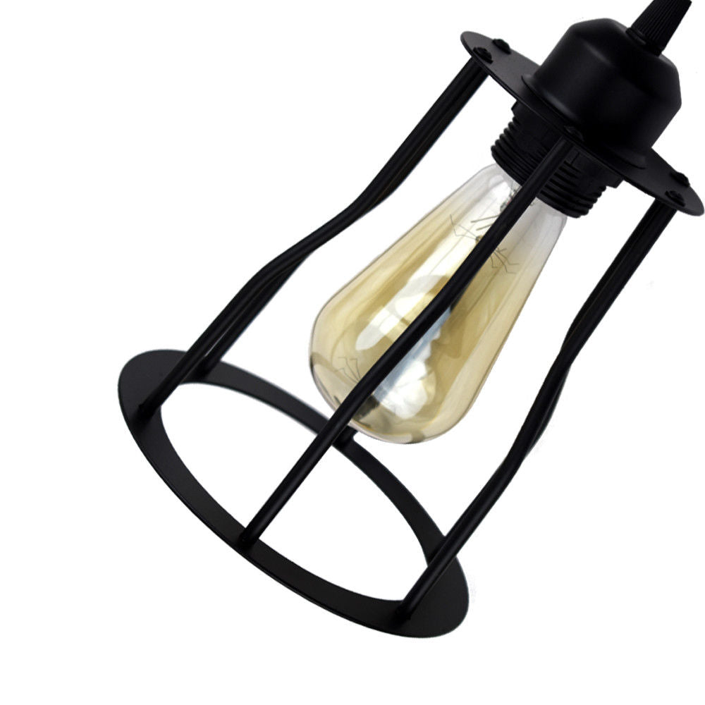 E27 filament bulb glowing inside pendant light